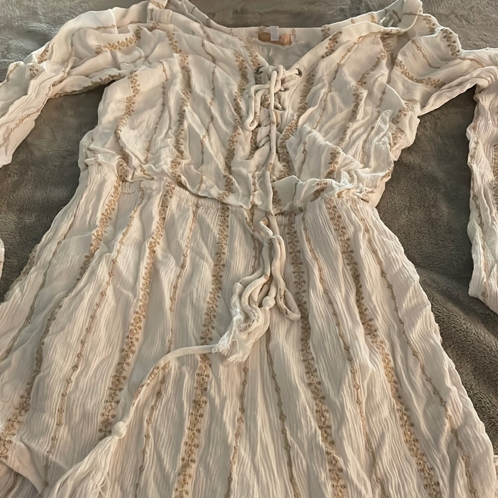 White and tan striped romper with gooey sleeves
